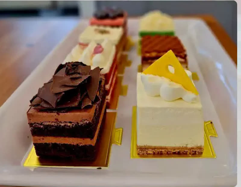 Sliced cakes on a tray at Cafe Time